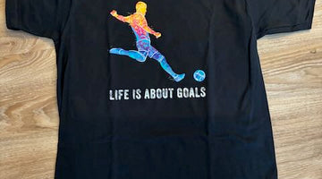 Strike Style with the 'Life is About Goals' Soccer T-Shirt