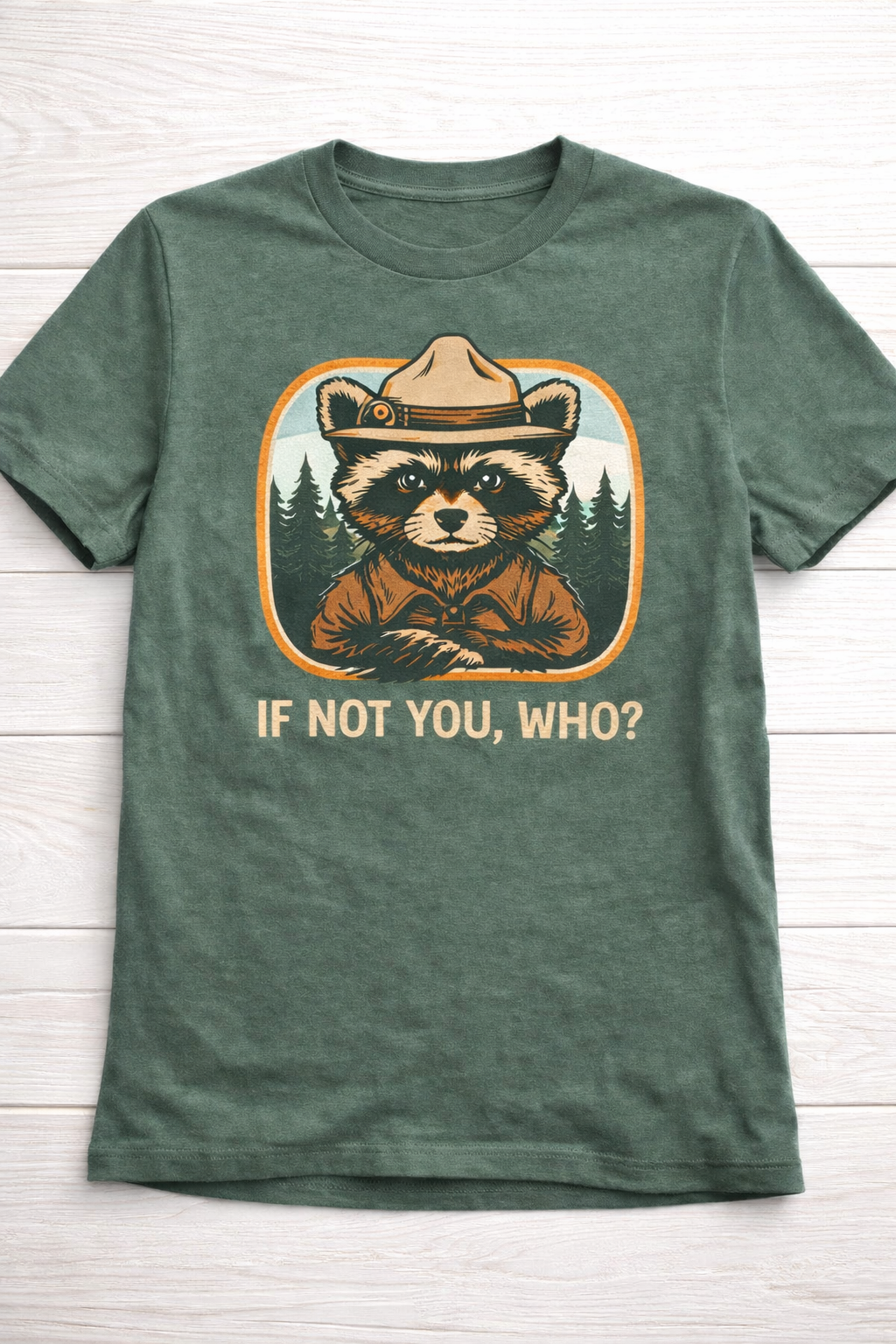 Forest green raccoon ranger graphic t-shirt with retro badge design and slogan If Not You Who